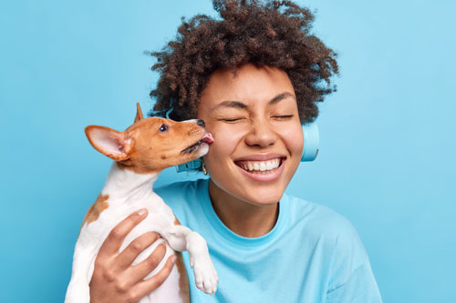Smiling woman with dog