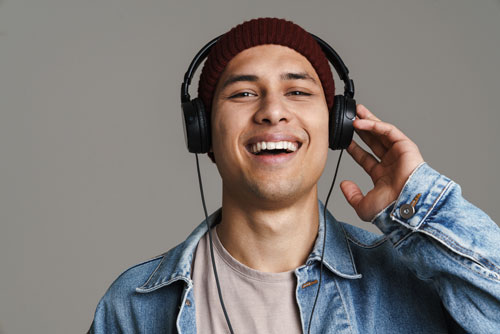 Man with headphones smiling